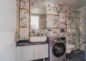 Modern apartment with a garden by the sea in a picturesque area